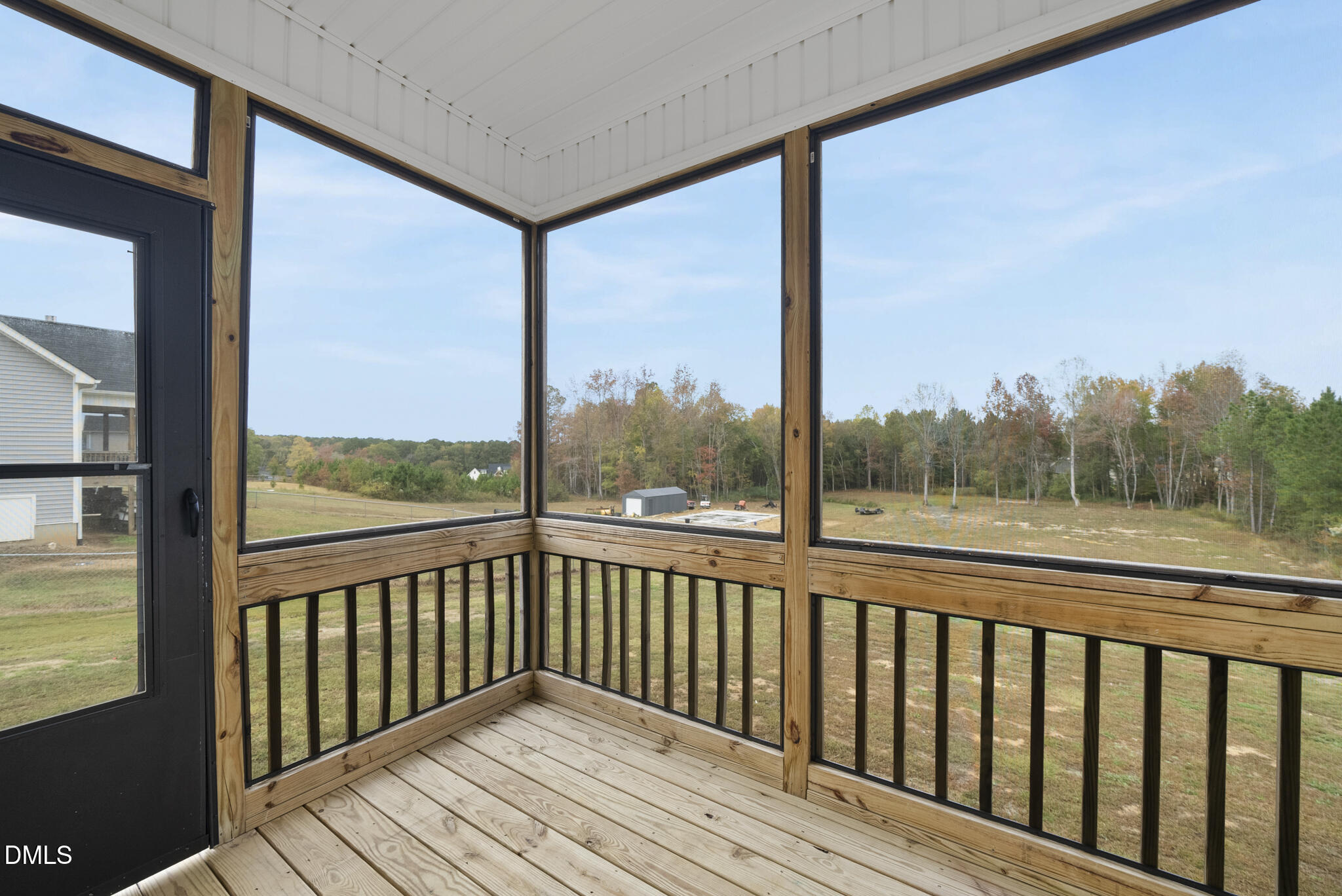 1177 Mudham Road Wendell, NC 27591 - Photo 27 of 30 a view of a balcony with wooden floor