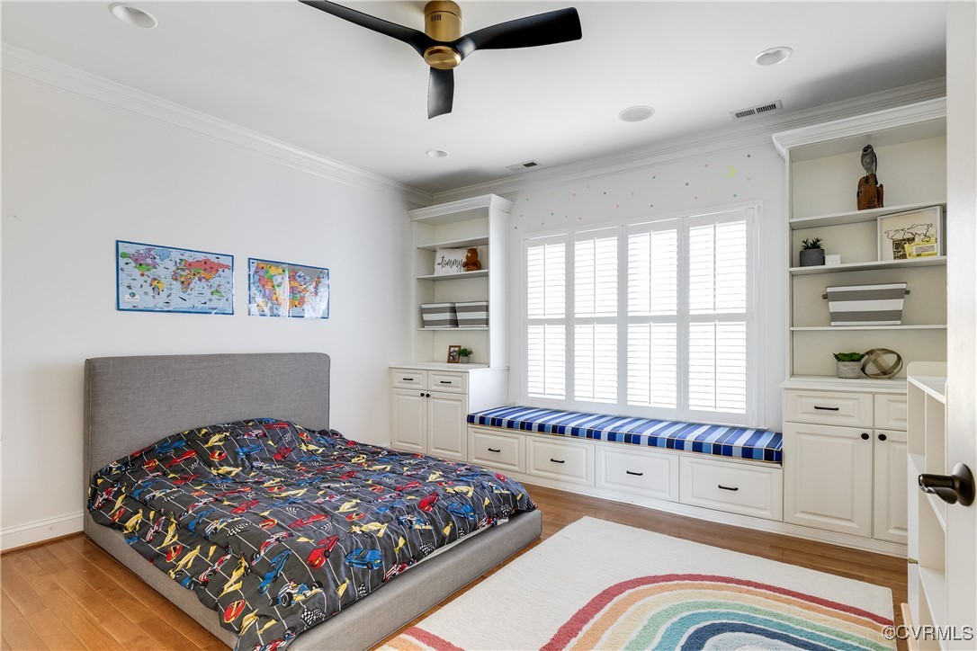 521 Raleigh Manor Road Henrico, VA 23229 - Photo 27 of 46 a bedroom with bed and window