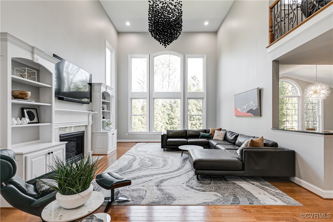 521 Raleigh Manor Road Henrico, VA 23229 - Photo 3 of 46 a living room with furniture fireplace and large windows