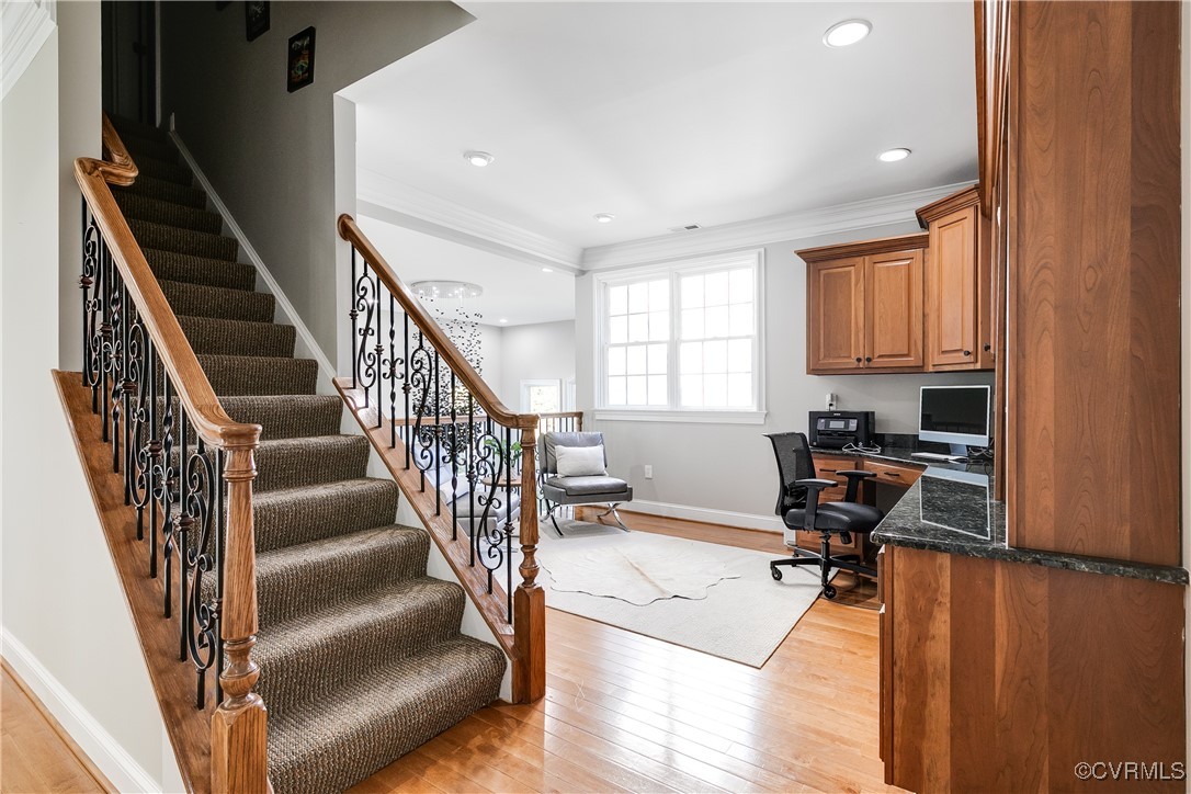 521 Raleigh Manor Road Henrico, VA 23229 - Photo 31 of 46 a view of a livingroom with wooden floor and stairs