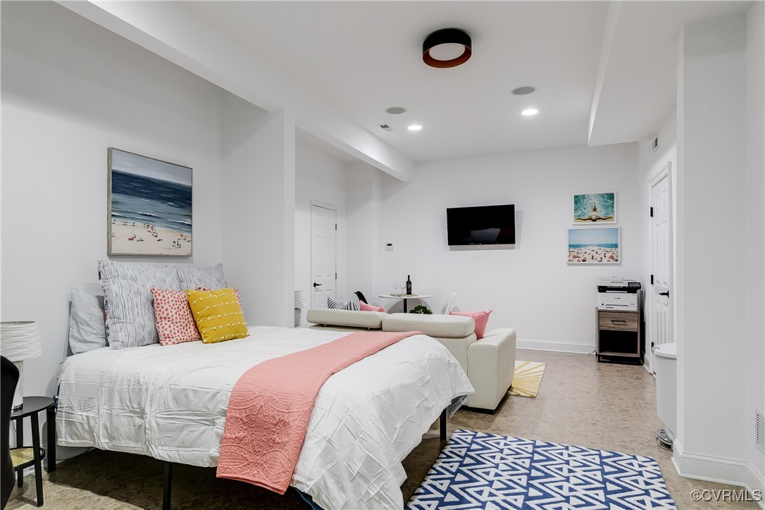 521 Raleigh Manor Road Henrico, VA 23229 - Photo 35 of 46 a bedroom with a bed and a tv