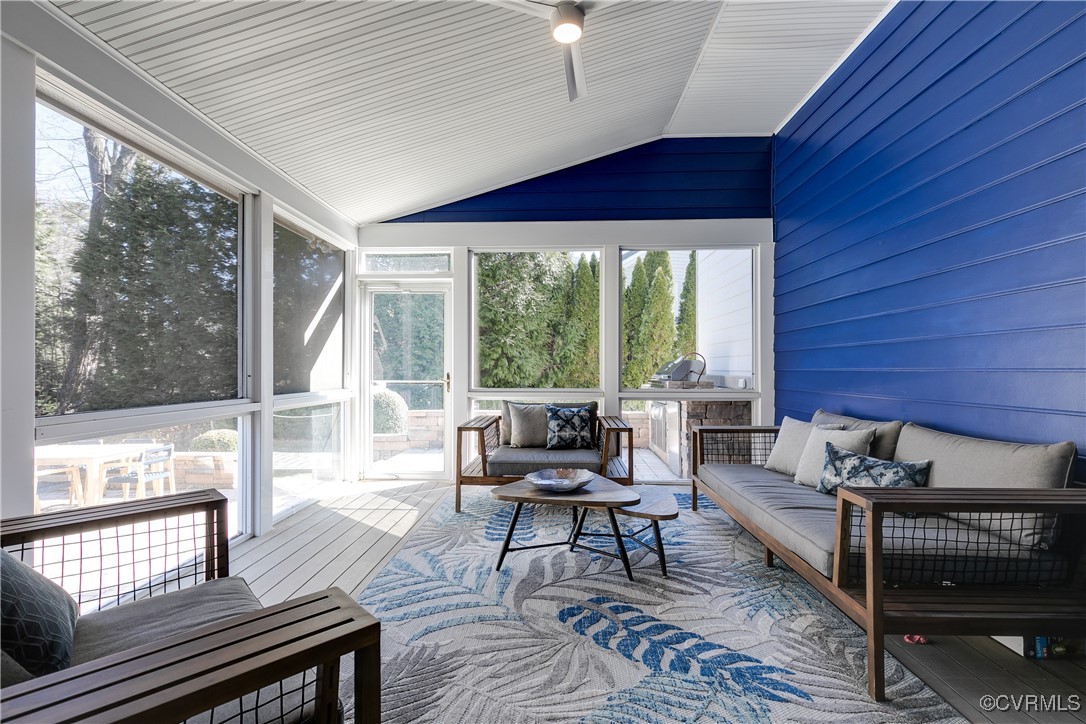521 Raleigh Manor Road Henrico, VA 23229 - Photo 38 of 46 a living room with furniture and a floor to ceiling window