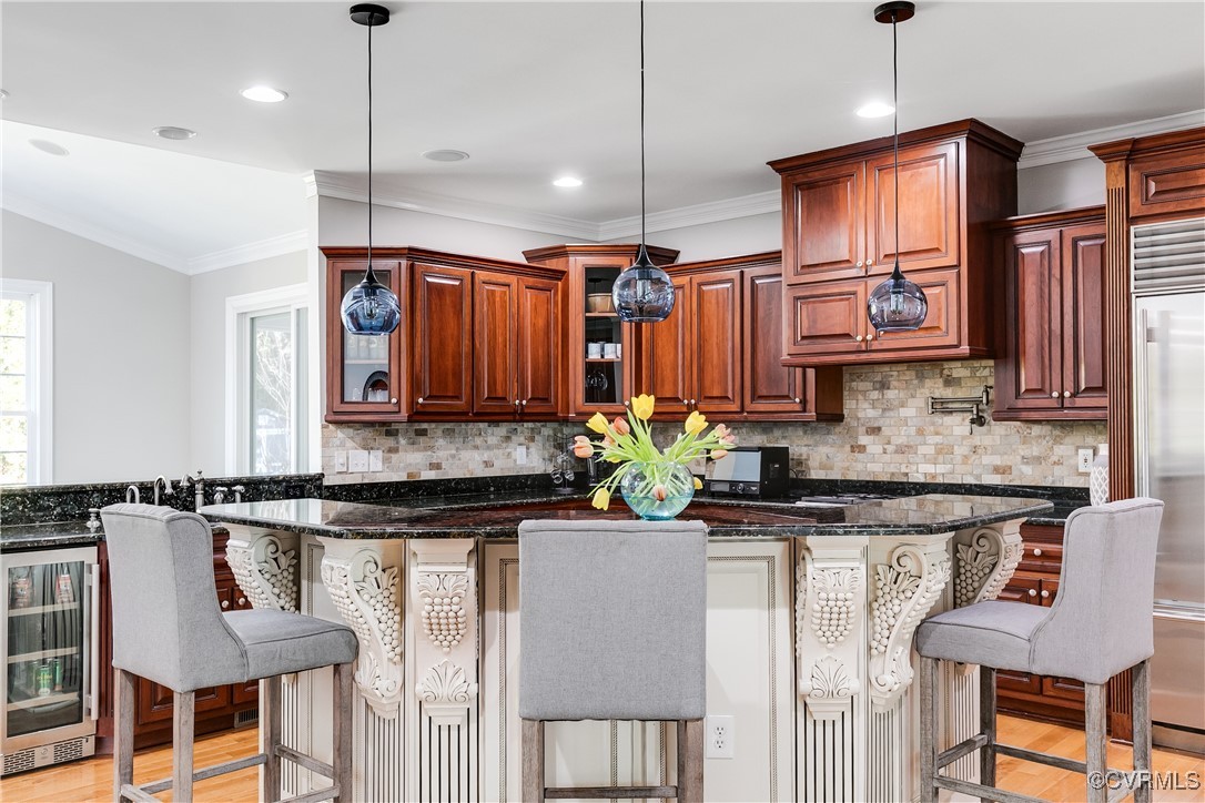 521 Raleigh Manor Road Henrico, VA 23229 - Photo 4 of 46 a kitchen with stainless steel appliances granite countertop a stove a sink and a refrigerator