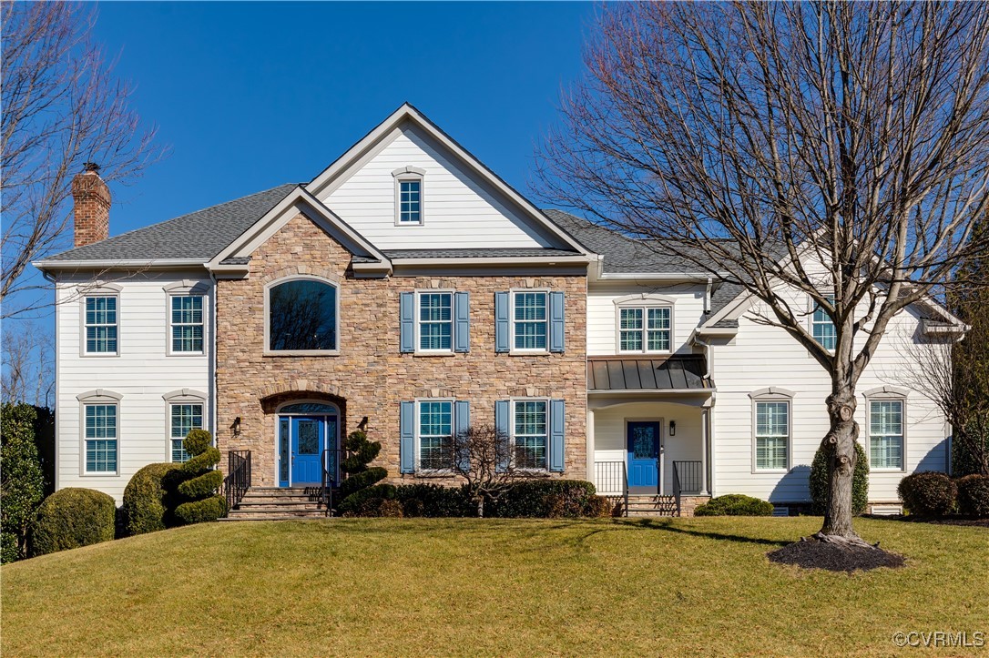 521 Raleigh Manor Road Henrico, VA 23229 - Photo 42 of 46 a front view of a house with a large tree