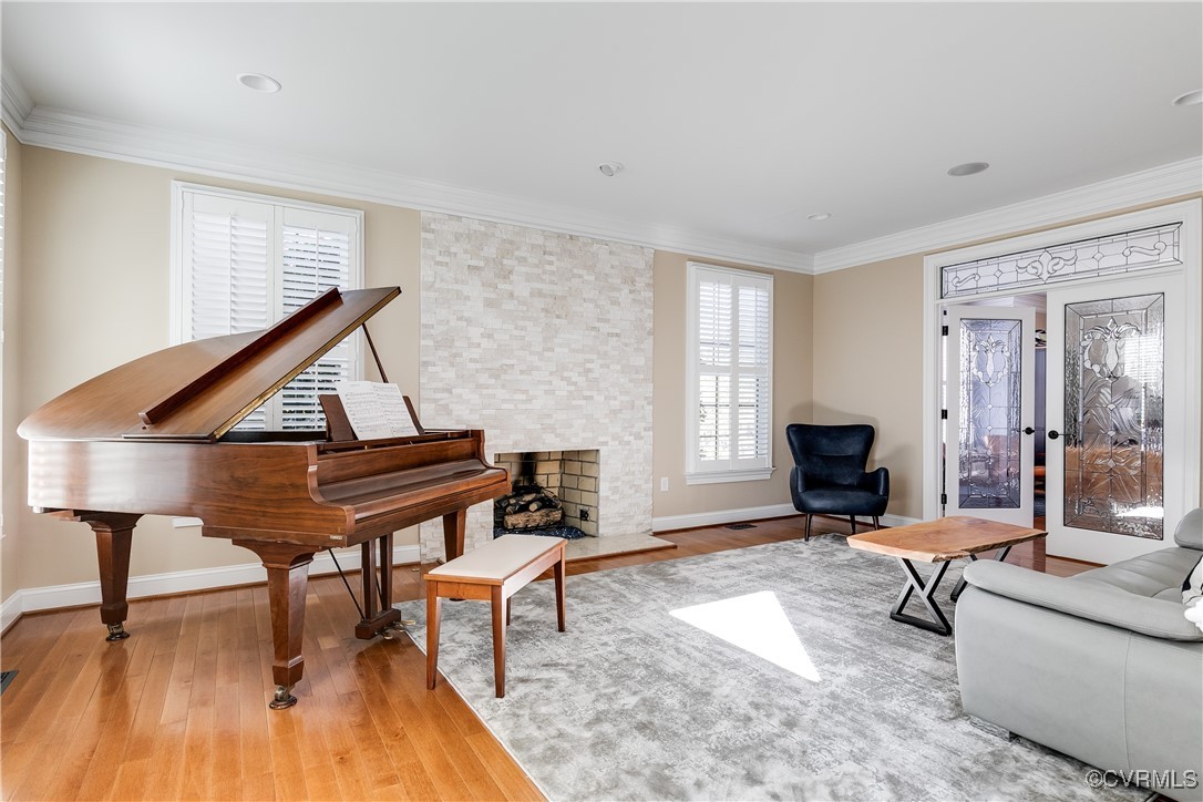 521 Raleigh Manor Road Henrico, VA 23229 - Photo 10 of 46 a living room with furniture and a wooden floor