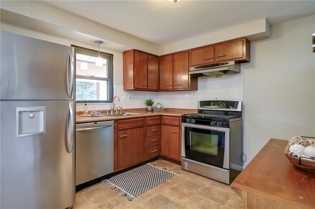 208 Lytton Road Coraopolis, PA 15108 - Photo 8 of 25 Quaint Kitchen with Newer Stainless Steel Appliances