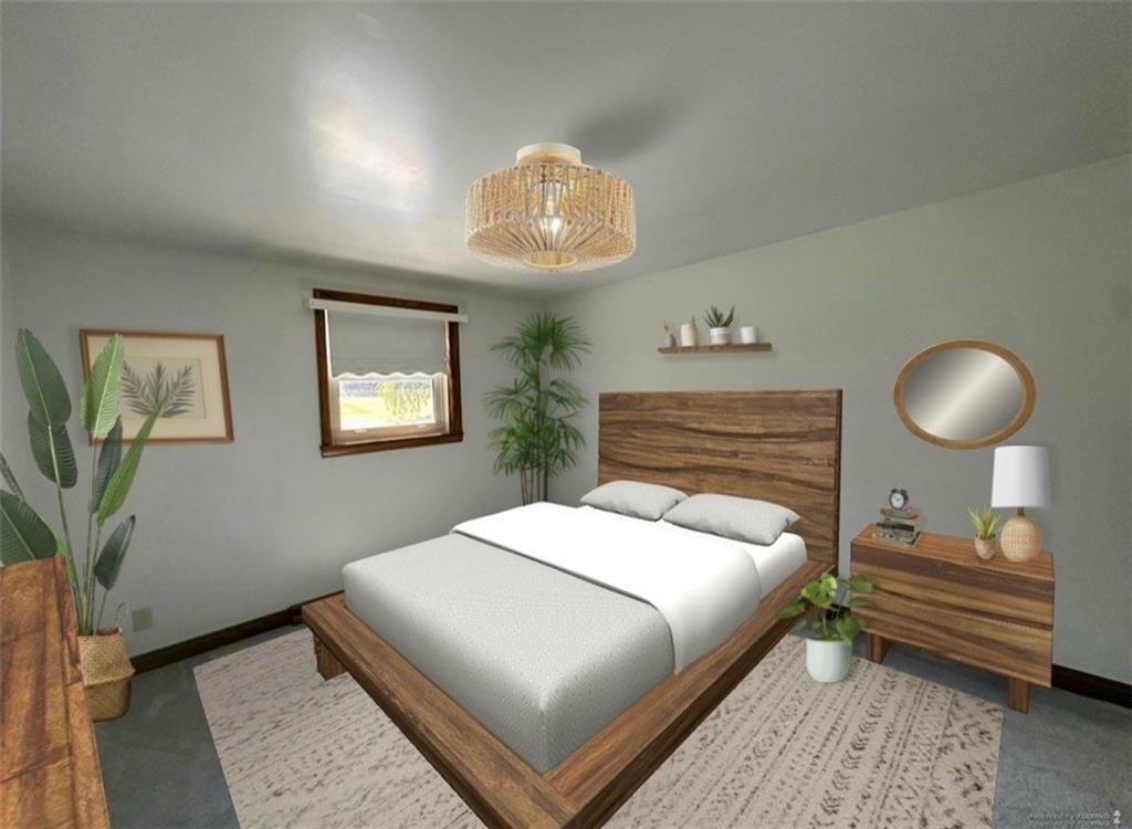 383 Bonniebrook Road Butler, PA 16002 - Photo 17 of 25 a bedroom with a bed and a chandelier