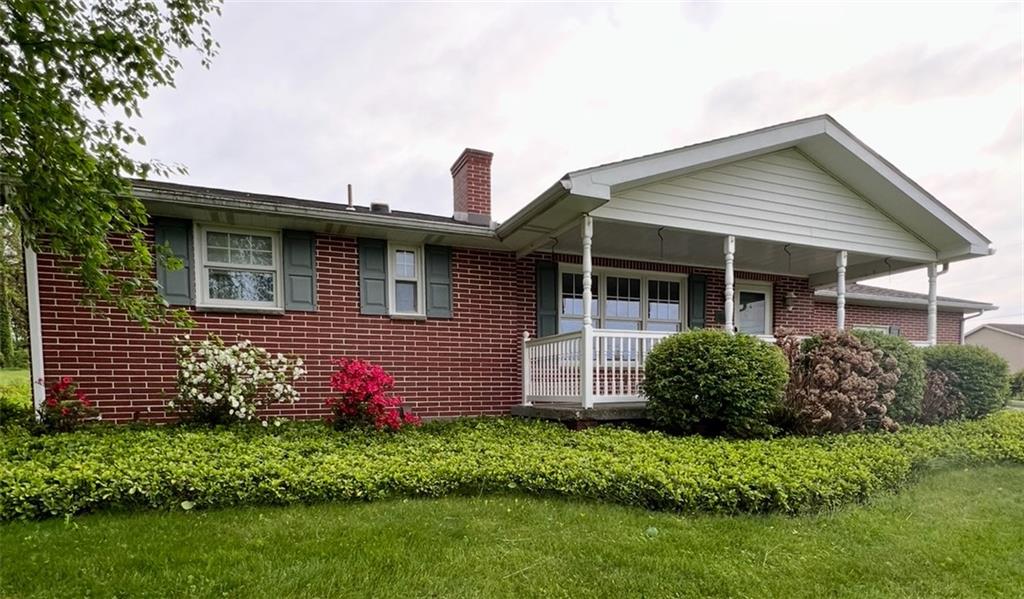 383 Bonniebrook Road Butler, PA 16002 - Photo 2 of 25 a front view of a house with garden
