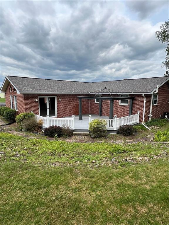 383 Bonniebrook Road Butler, PA 16002 - Photo 22 of 25 a front view of house with yard and trees around