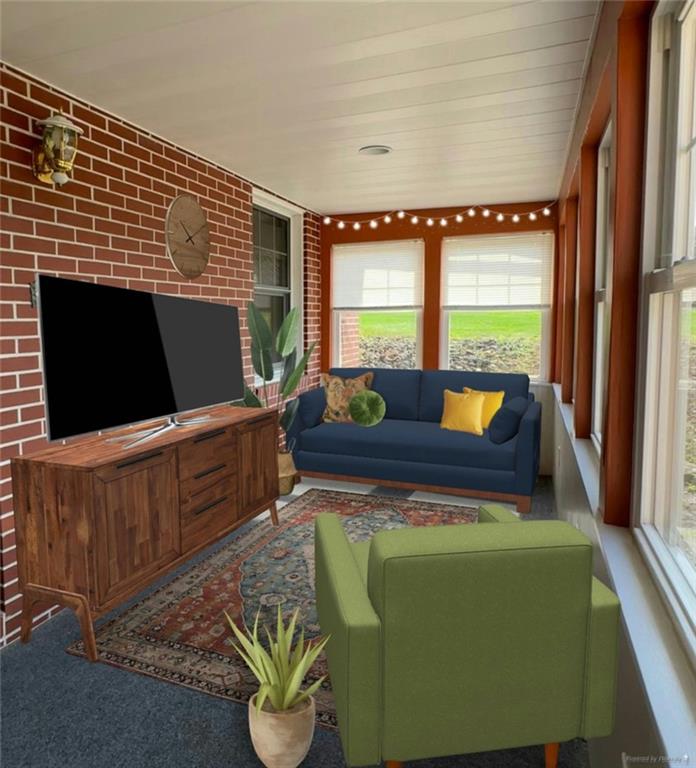 383 Bonniebrook Road Butler, PA 16002 - Photo 6 of 25 a living room with furniture stove and a flat screen tv