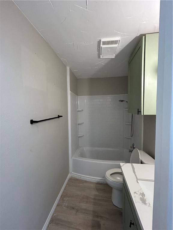 1613 Cheyenne Street Portland, TX 78374 - Photo 22 of 25 a bathroom with a granite countertop sink a toilet and shower