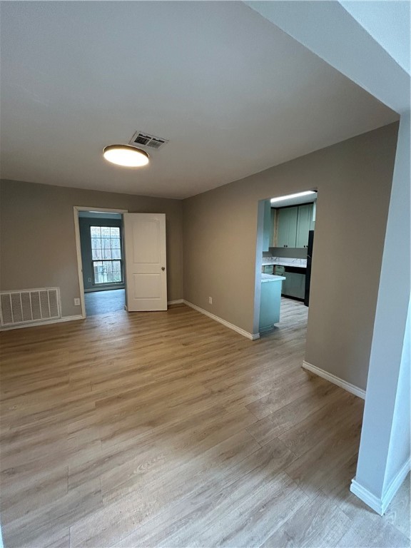 1613 Cheyenne Street Portland, TX 78374 - Photo 8 of 25 a view of empty room with wooden floor