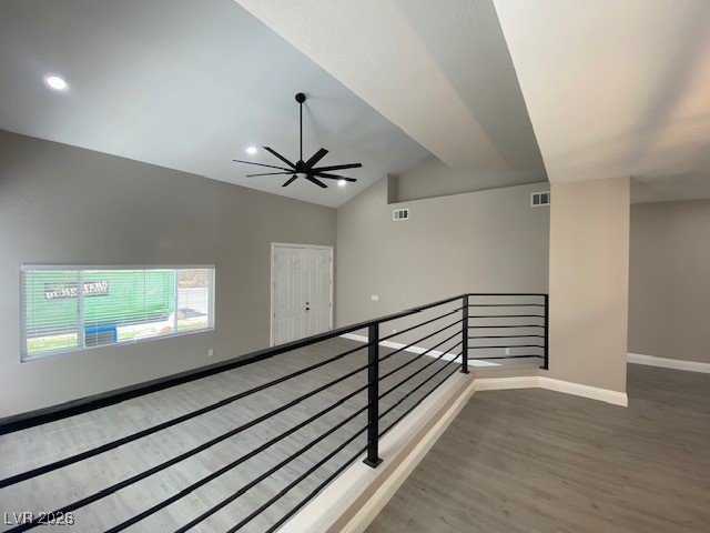 3702 River Canyon Road Las Vegas, NV 89129 - Photo 4 of 35 Hall with vaulted ceiling and wood finished floors