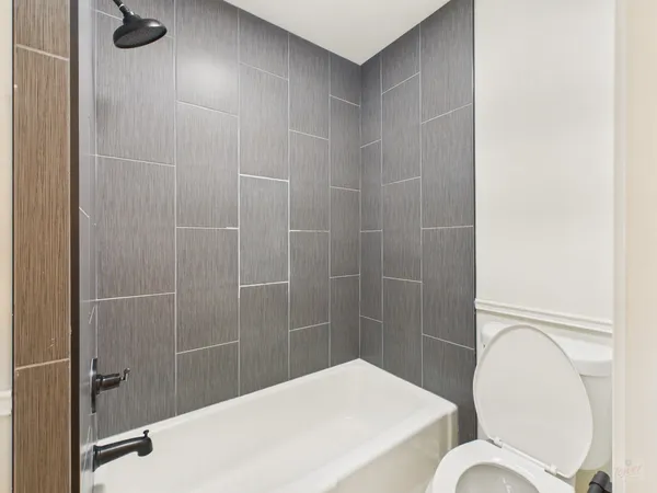 a bathroom with a granite countertop sink mirror and a