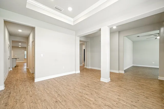 a spacious bathroom with a bathtub and a shower