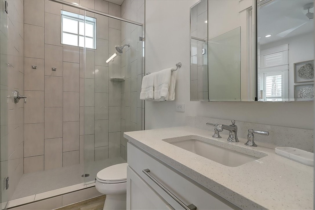 204 Round Road Port Aransas, TX 78373 - Photo 16 of 33 a bathroom with a sink toilet and shower