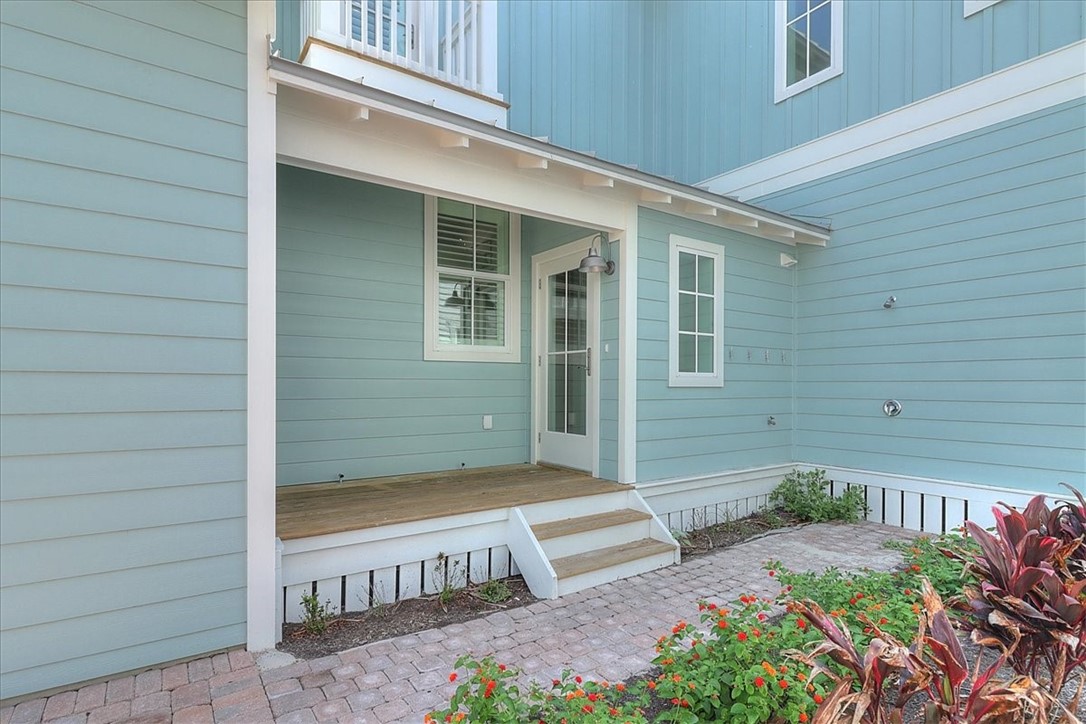 204 Round Road Port Aransas, TX 78373 - Photo 25 of 33 a view of a house with a backyard