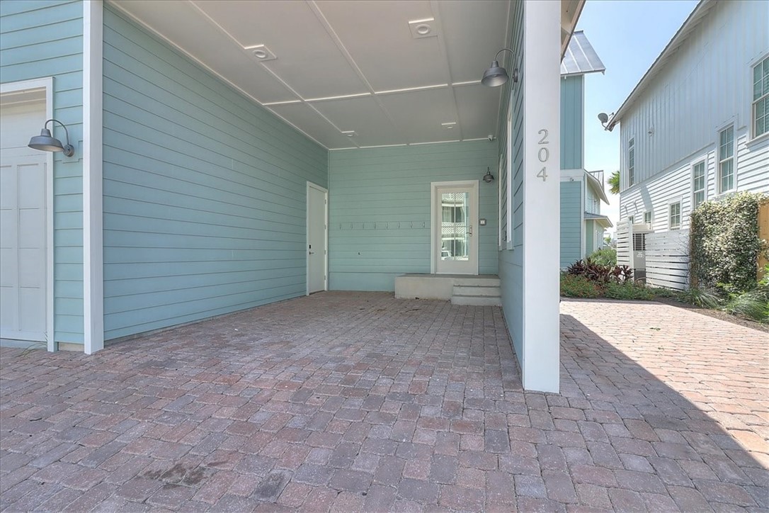 204 Round Road Port Aransas, TX 78373 - Photo 26 of 33 a view of a house with a outdoor space