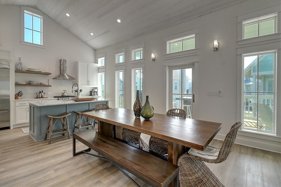 204 Round Road Port Aransas, TX 78373 - Photo 4 of 33 a room with stainless steel appliances lots of wooden furniture desk and chair