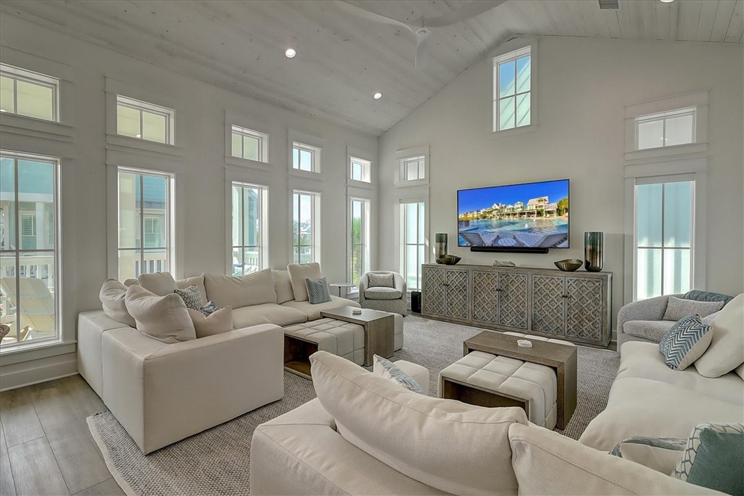 204 Round Road Port Aransas, TX 78373 - Photo 6 of 33 a living room with furniture and a flat screen tv