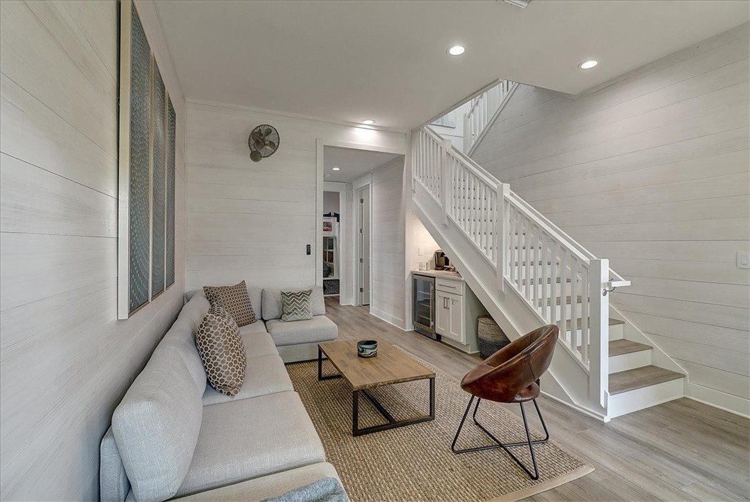204 Round Road Port Aransas, TX 78373 - Photo 8 of 33 a living room with furniture and a wooden floor