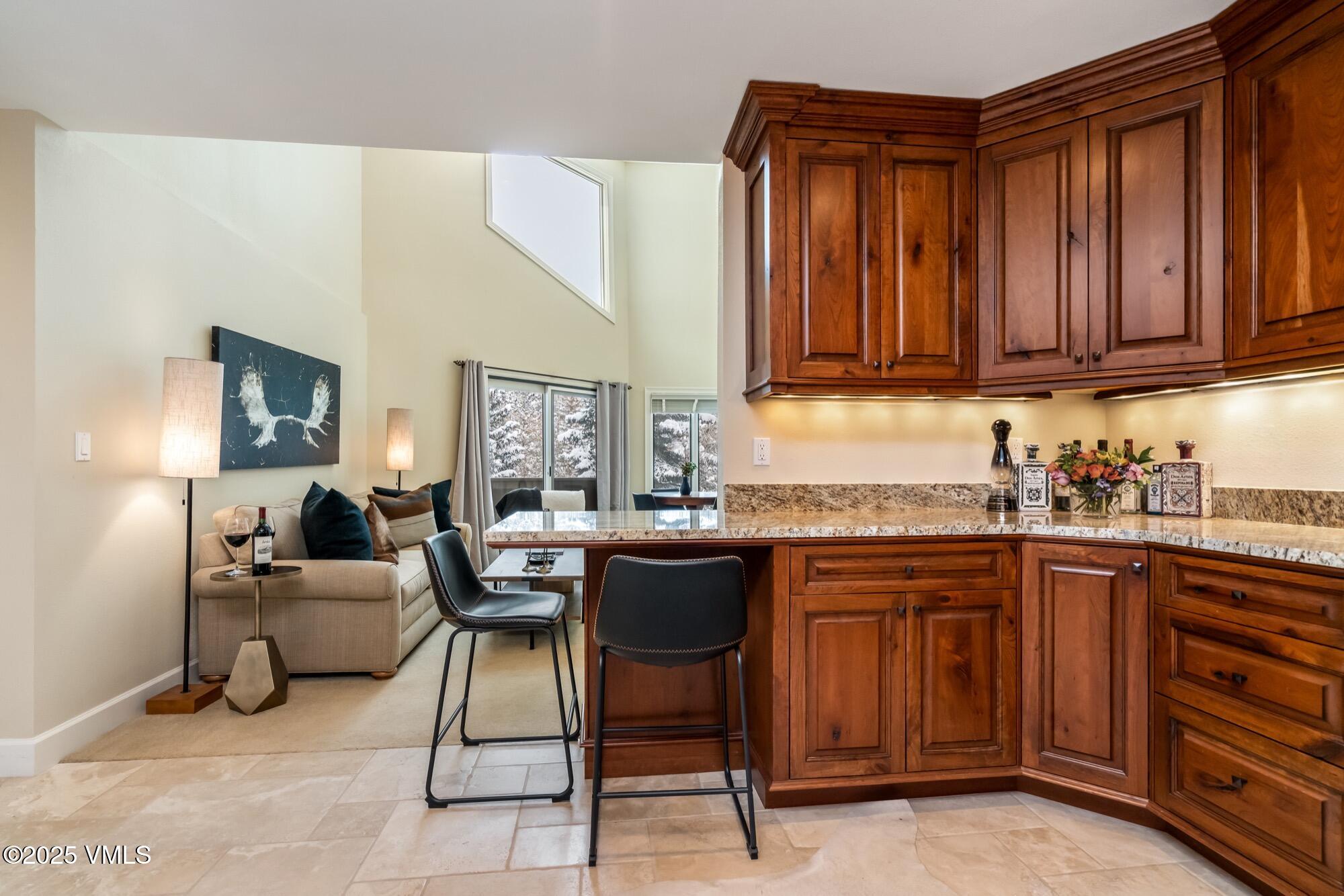 945 Red Sandstone Road, Unit A5 Vail, CO 81657 - Photo 13 of 38 a kitchen with a sink cabinets and window