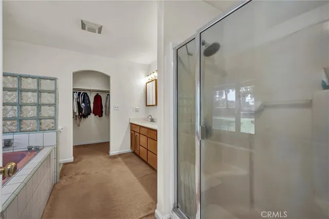 a view of a bathroom from the hallway