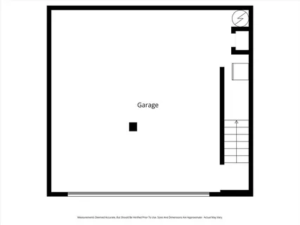 a living room with furniture fireplace and a large window