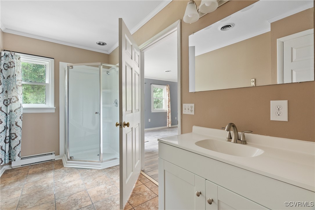 2957 Broad St Road Gum Spring, VA 23065 - Photo 17 of 36 a bathroom with a sink and a mirror