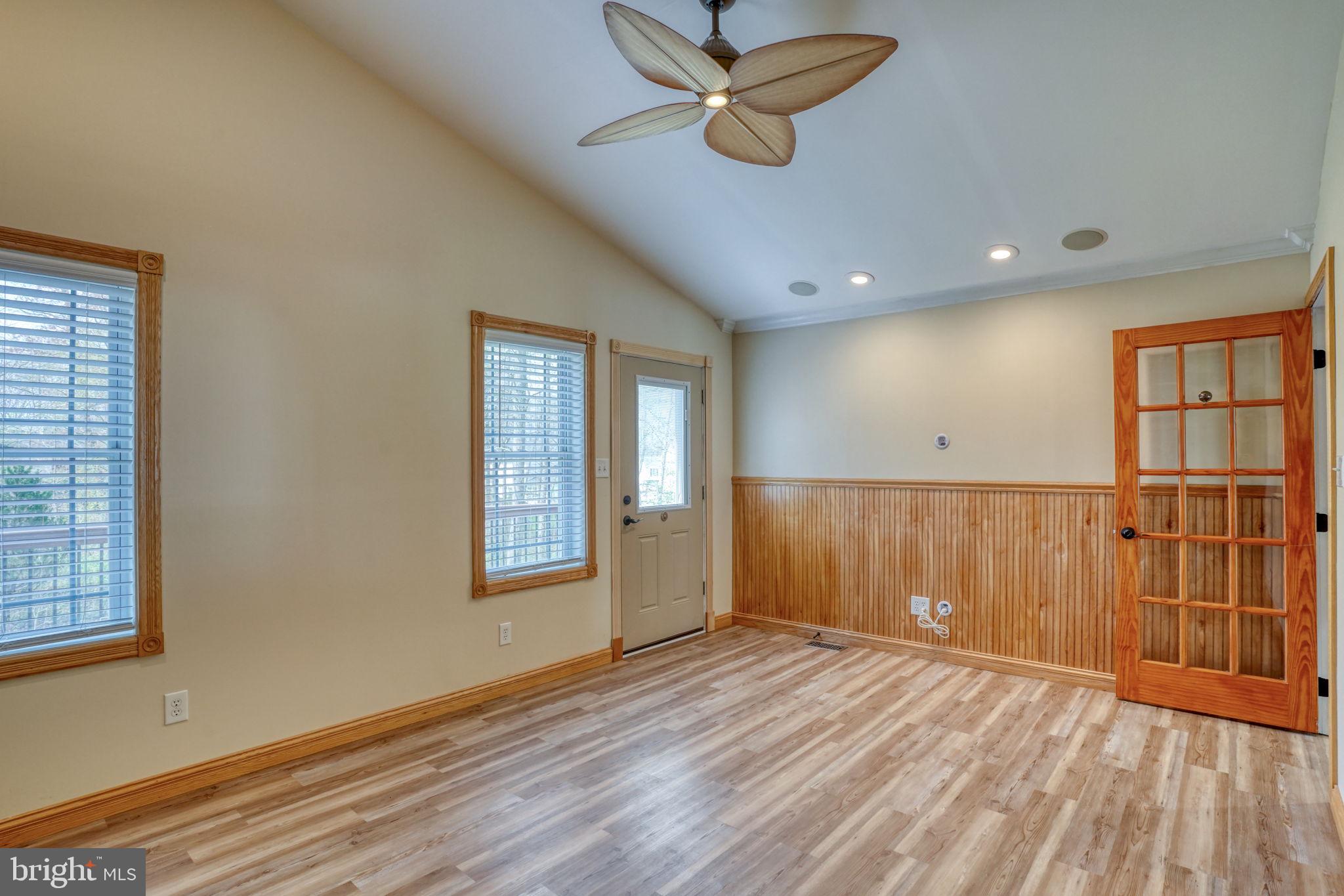 5 Kings Court Elkton, MD 21921 - Photo 13 of 47 a view of an empty room with a window and wooden floor