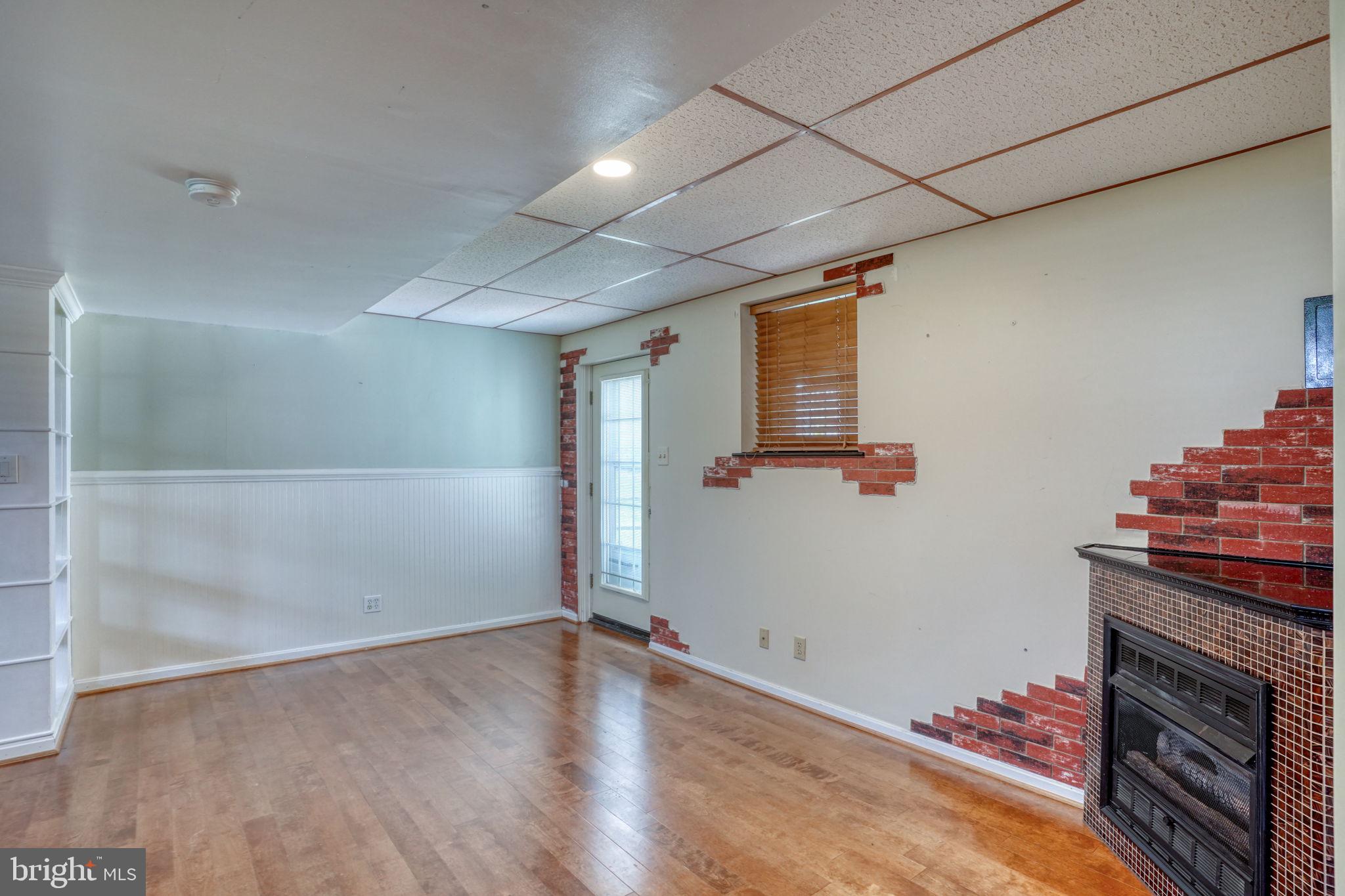 5 Kings Court Elkton, MD 21921 - Photo 28 of 47 a view of a livingroom with wooden floor and a kitchen space