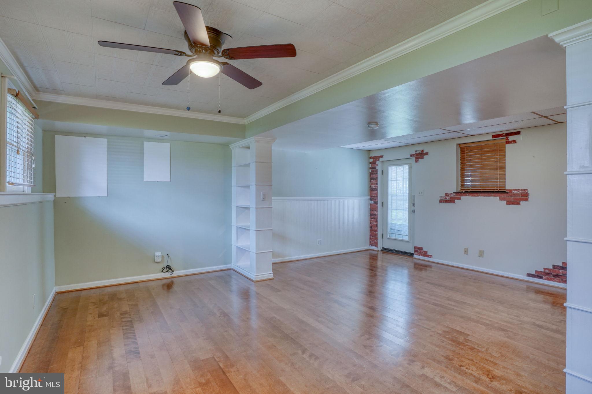 5 Kings Court Elkton, MD 21921 - Photo 30 of 47 an empty room with wooden floor and ceiling fan