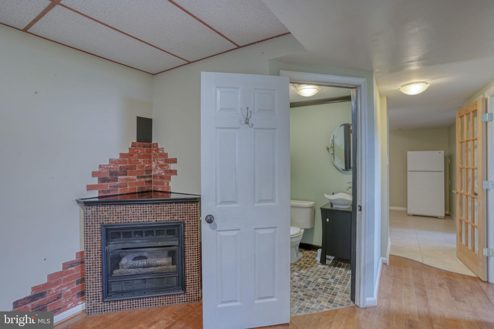 5 Kings Court Elkton, MD 21921 - Photo 32 of 47 a bathroom with a sink and a mirror