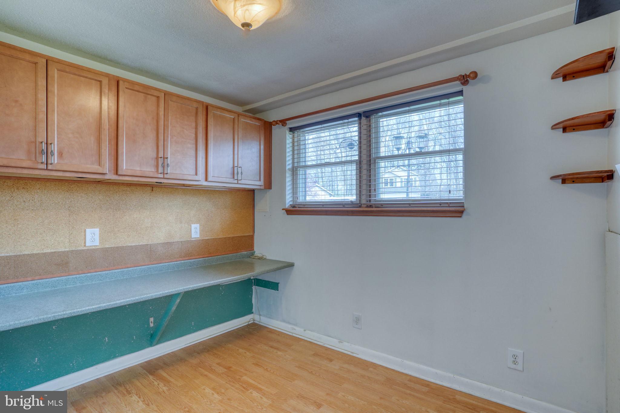 5 Kings Court Elkton, MD 21921 - Photo 34 of 47 a room with window and cabinet