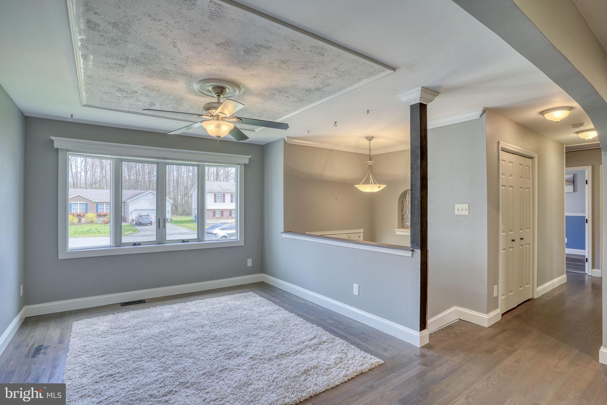 5 Kings Court Elkton, MD 21921 - Photo 4 of 47 an empty room with windows and entrance