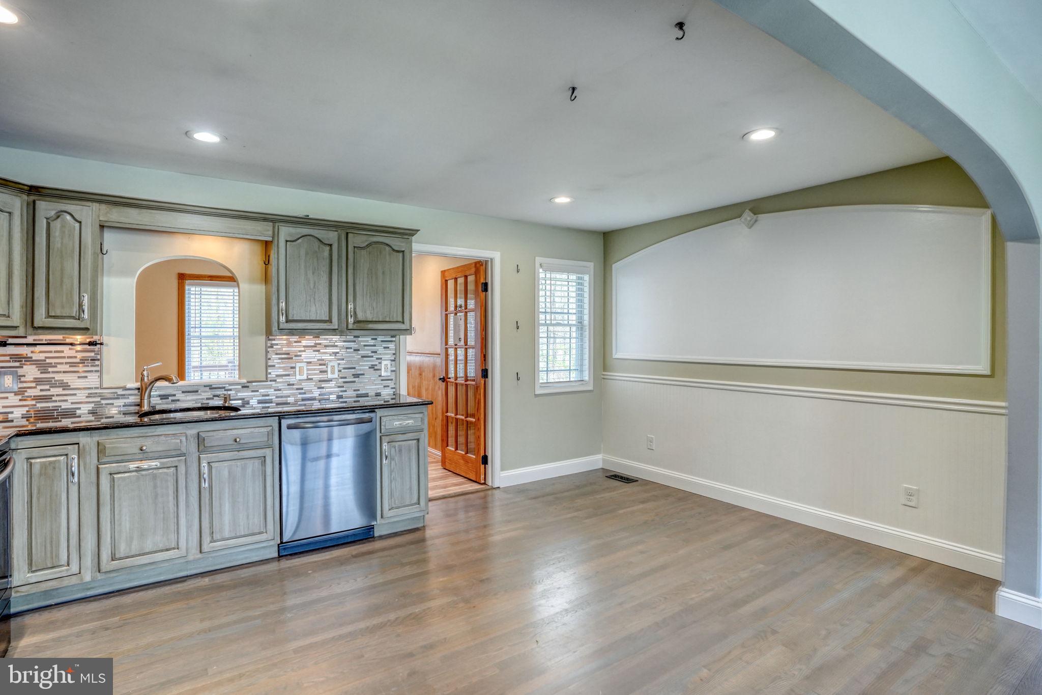 5 Kings Court Elkton, MD 21921 - Photo 9 of 47 a hall with stainless steel appliances granite countertop a refrigerator and a sink