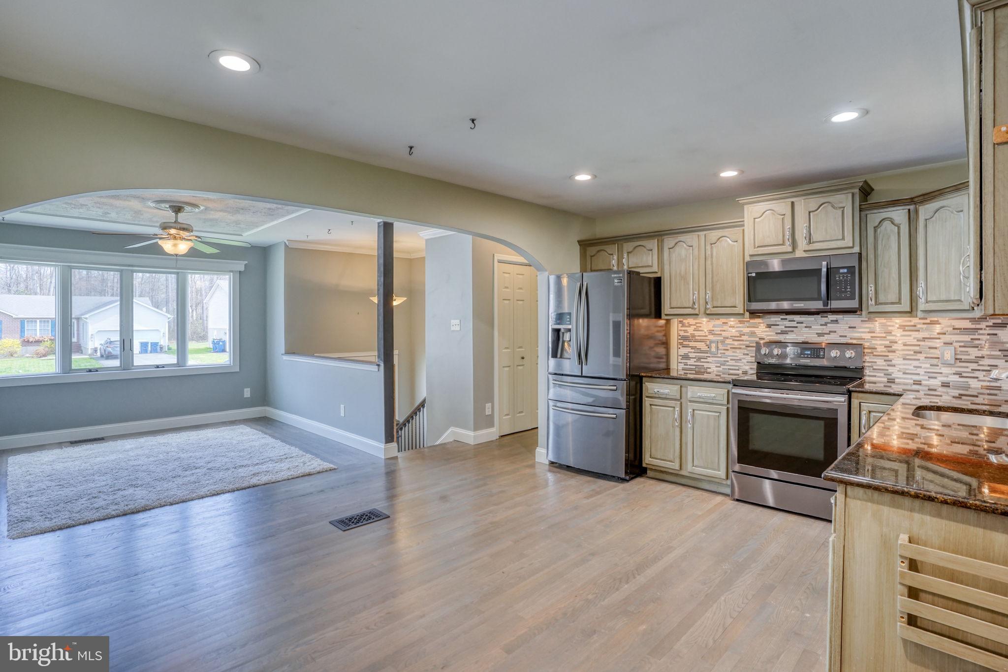 5 Kings Court Elkton, MD 21921 - Photo 10 of 47 a kitchen with stainless steel appliances granite countertop a refrigerator stove top oven and sink