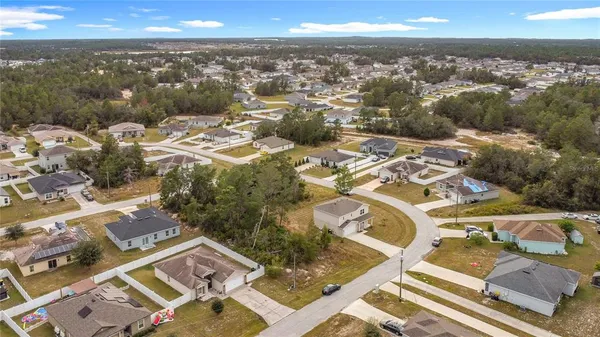 an aerial view of residential building with parking space
