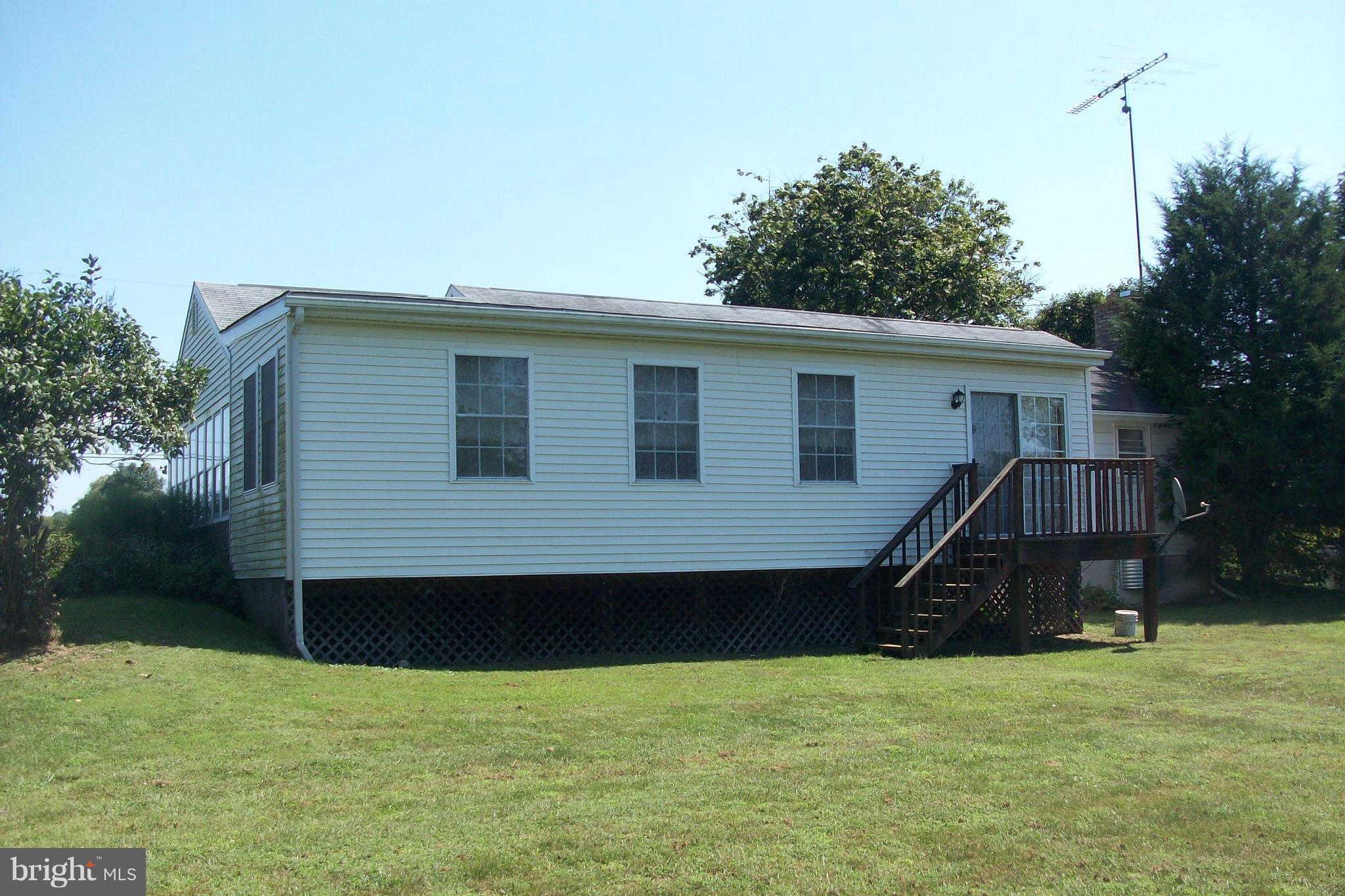 225 Mud College Road Littlestown, PA 17340 - Photo 2 of 13 Enclosed 4 season room in back