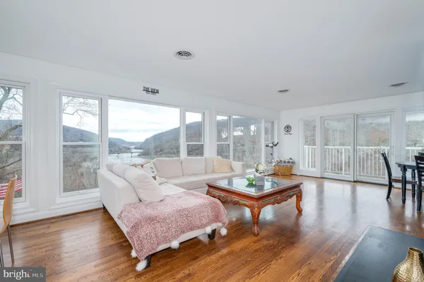 a living room with furniture and a table