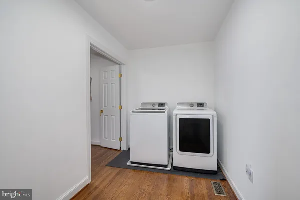 a view of entryway with wooden floor