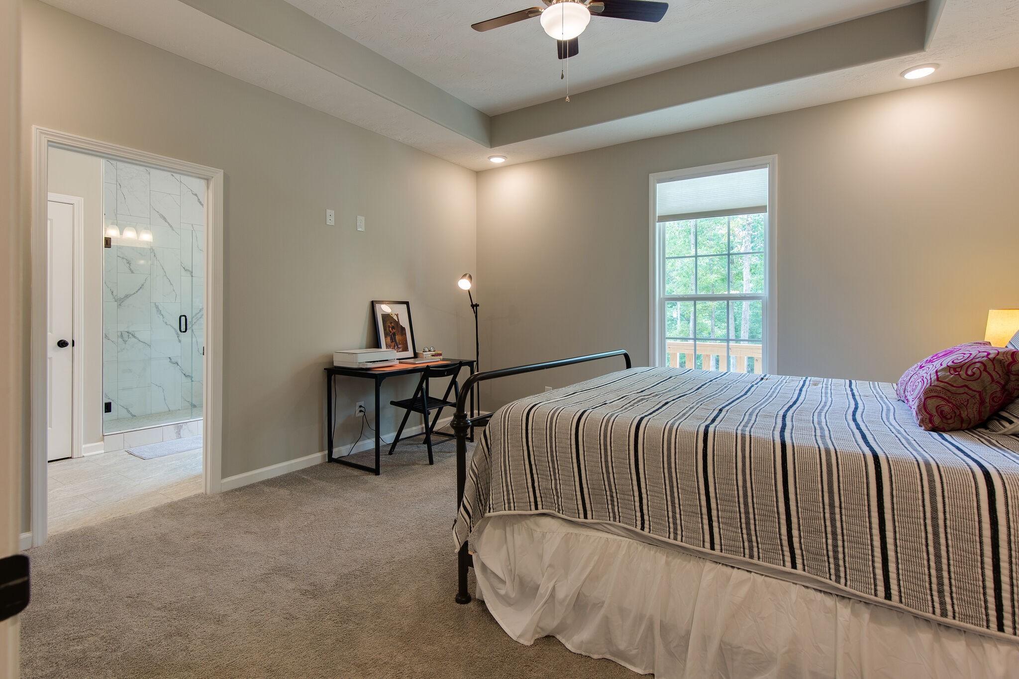 1079 Garton Road Burns, TN 37029 - Photo 14 of 25 a bedroom with a bed and a chandelier