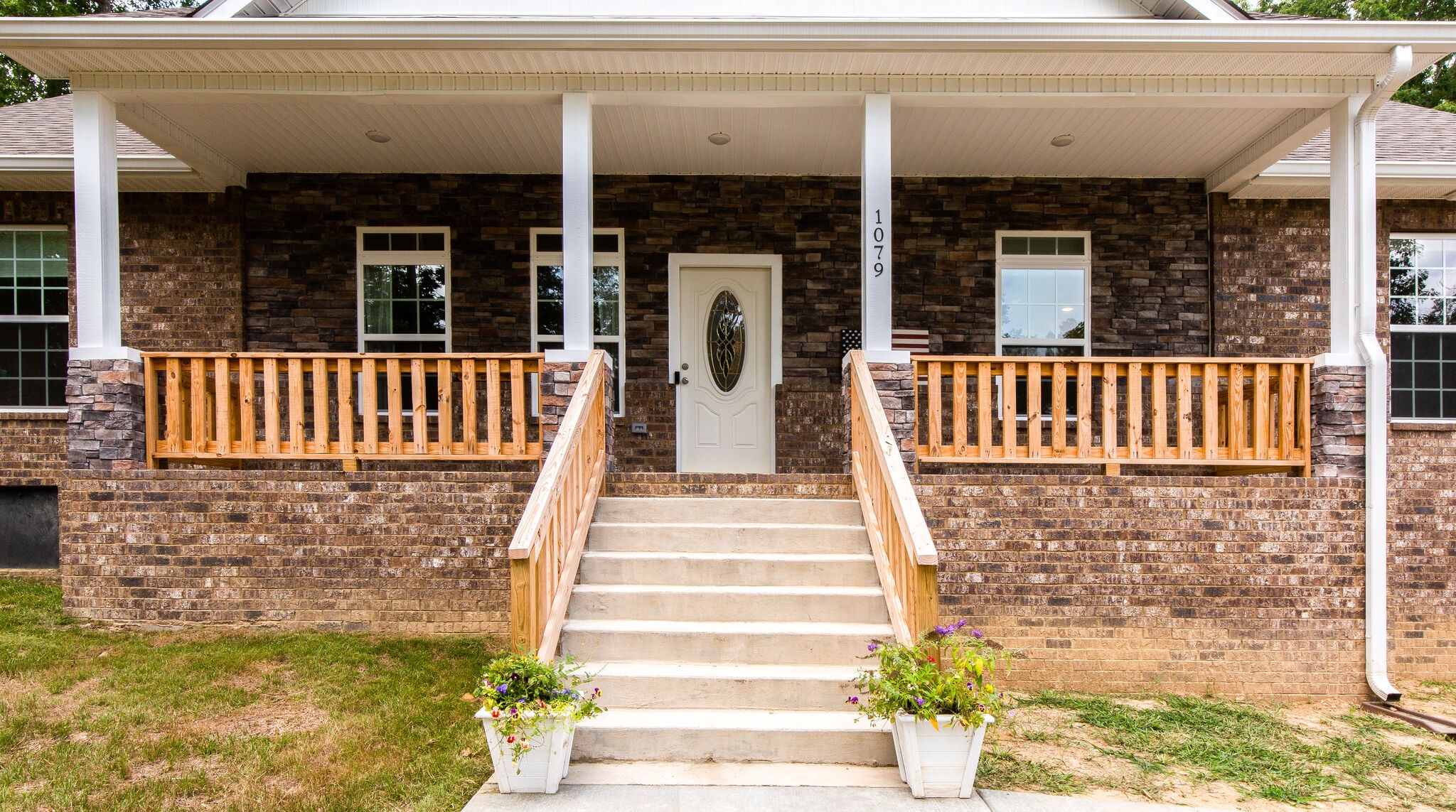 1079 Garton Road Burns, TN 37029 - Photo 4 of 25 a front view of a house with a porch