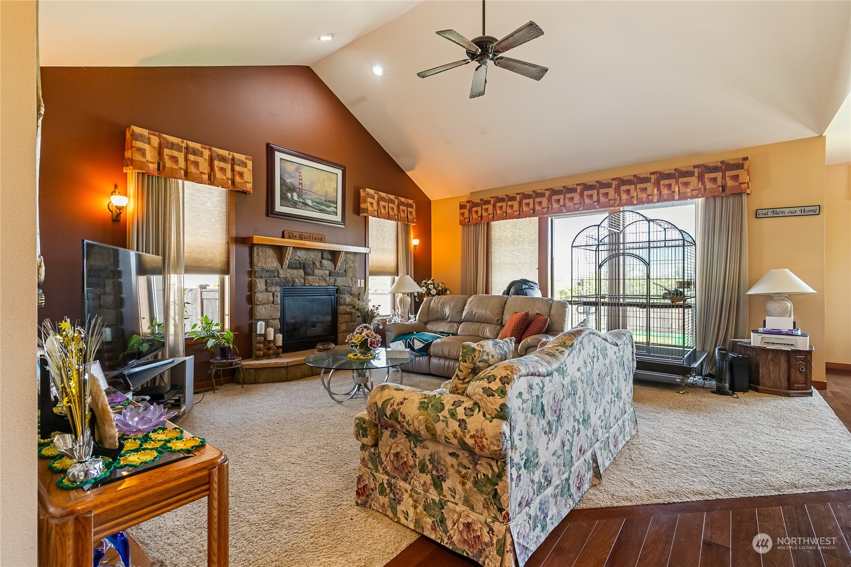 1524 Westview Circle Lynden, WA 98264 - Photo 14 of 30 a living room with fireplace furniture and a floor to ceiling window