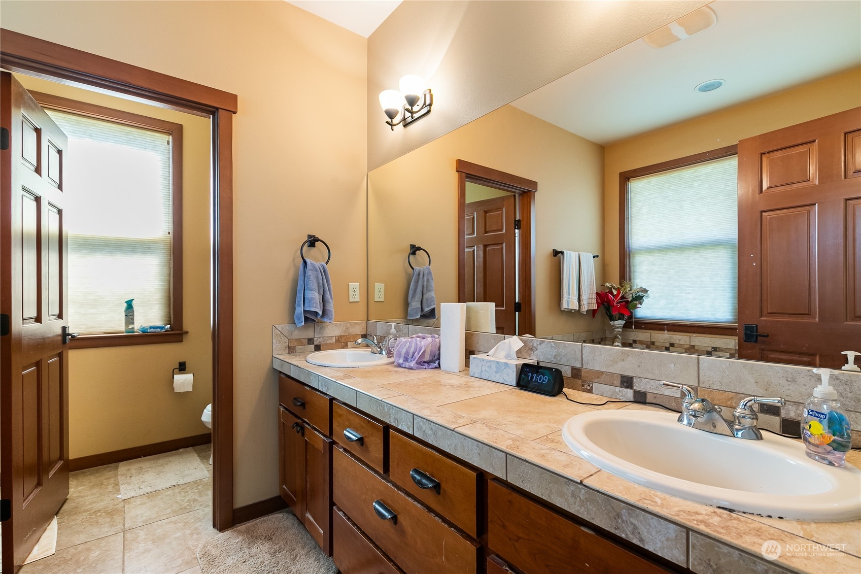 1524 Westview Circle Lynden, WA 98264 - Photo 23 of 30 a bathroom with double vanity sinks and a mirror