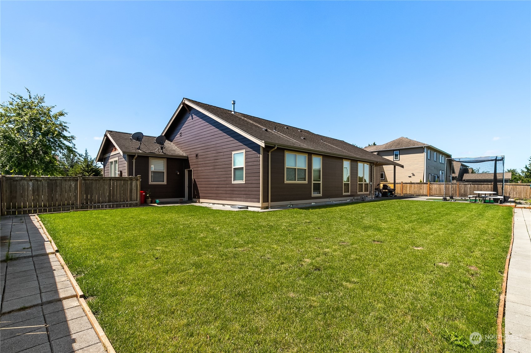 1524 Westview Circle Lynden, WA 98264 - Photo 27 of 30 a front view of a house with a garden and porch