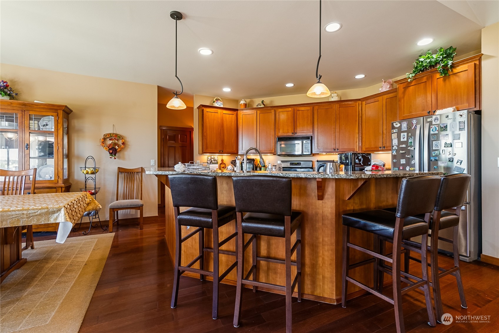 1524 Westview Circle Lynden, WA 98264 - Photo 6 of 30 a dining hall with stainless steel appliances a dining table chairs and view living room
