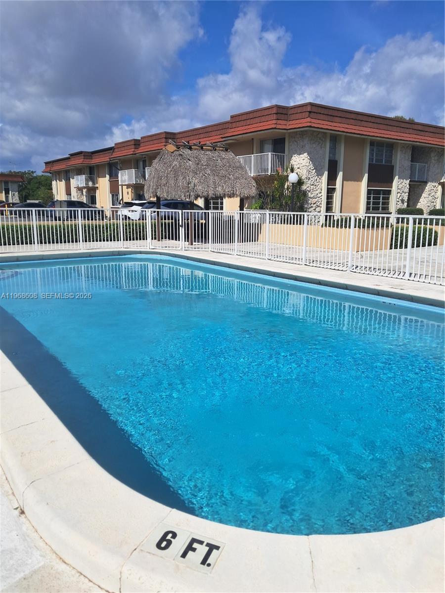 a view of a house with a swimming pool