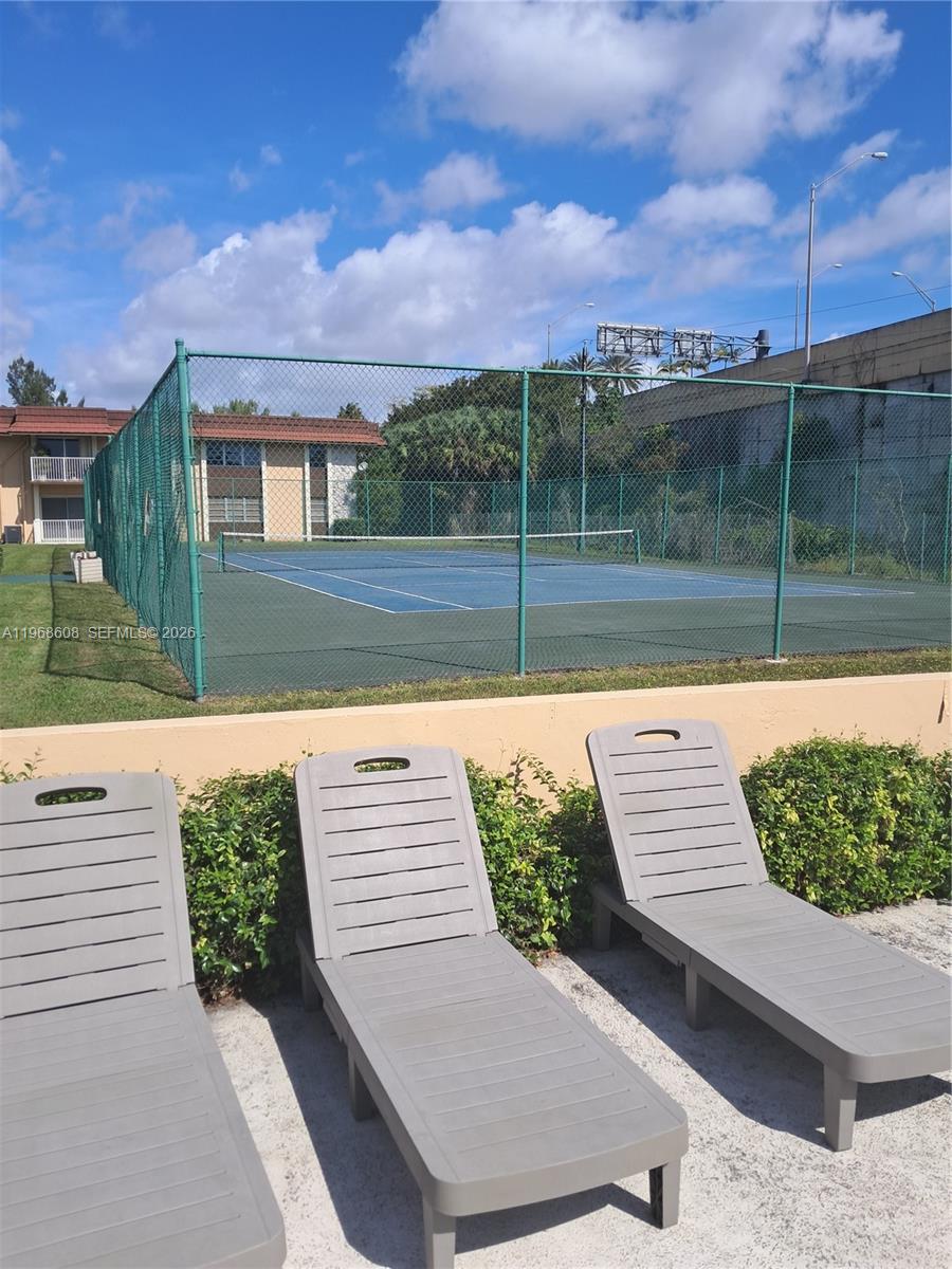 5425 Southwest 77th Court, Unit 102D Miami, FL 33155 - Photo 2 of 22 a view of a terrace
