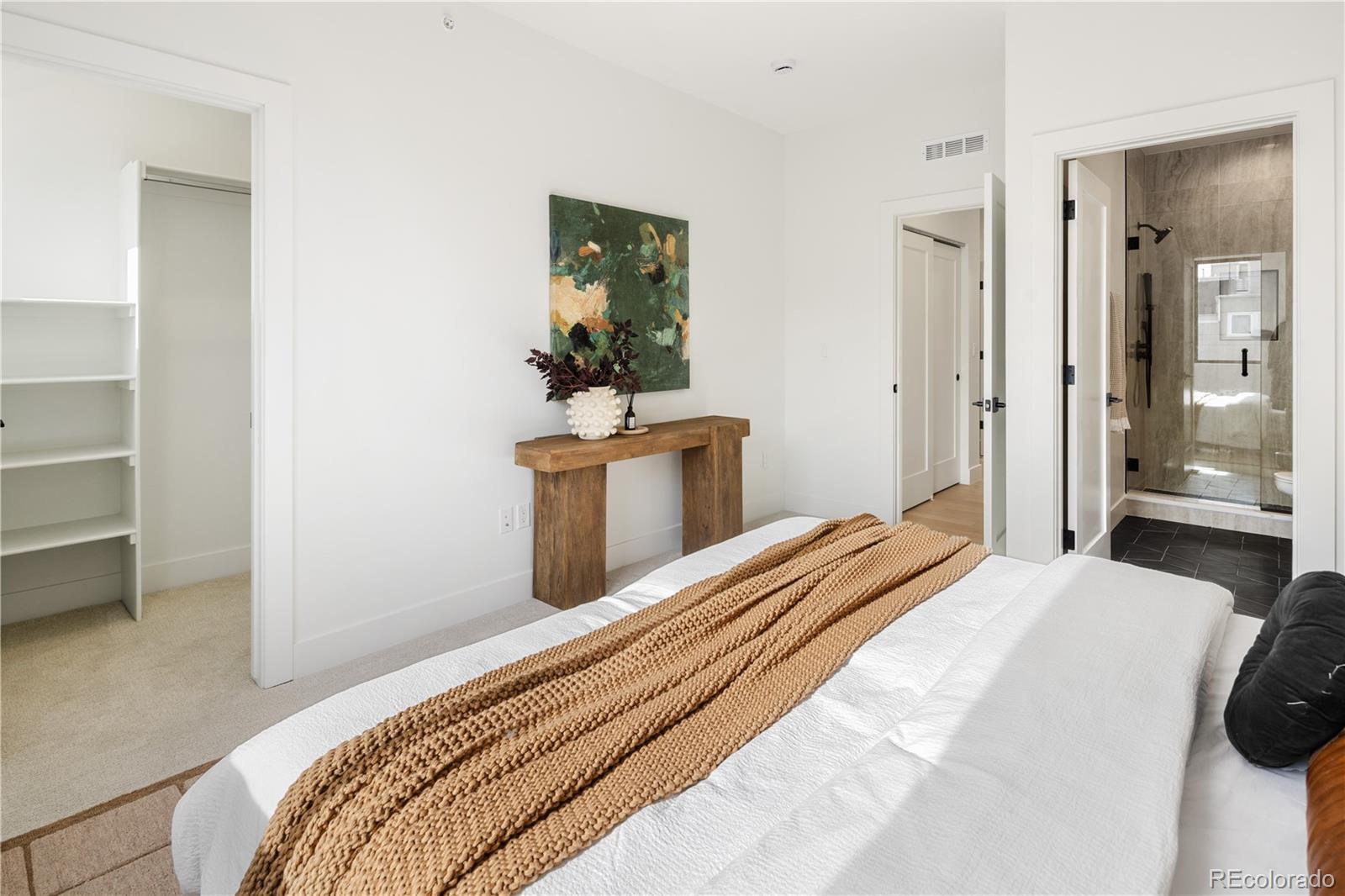 4517 Tennyson Street Denver, CO 80212 - Photo 18 of 28 a bedroom with a bed and a dresser